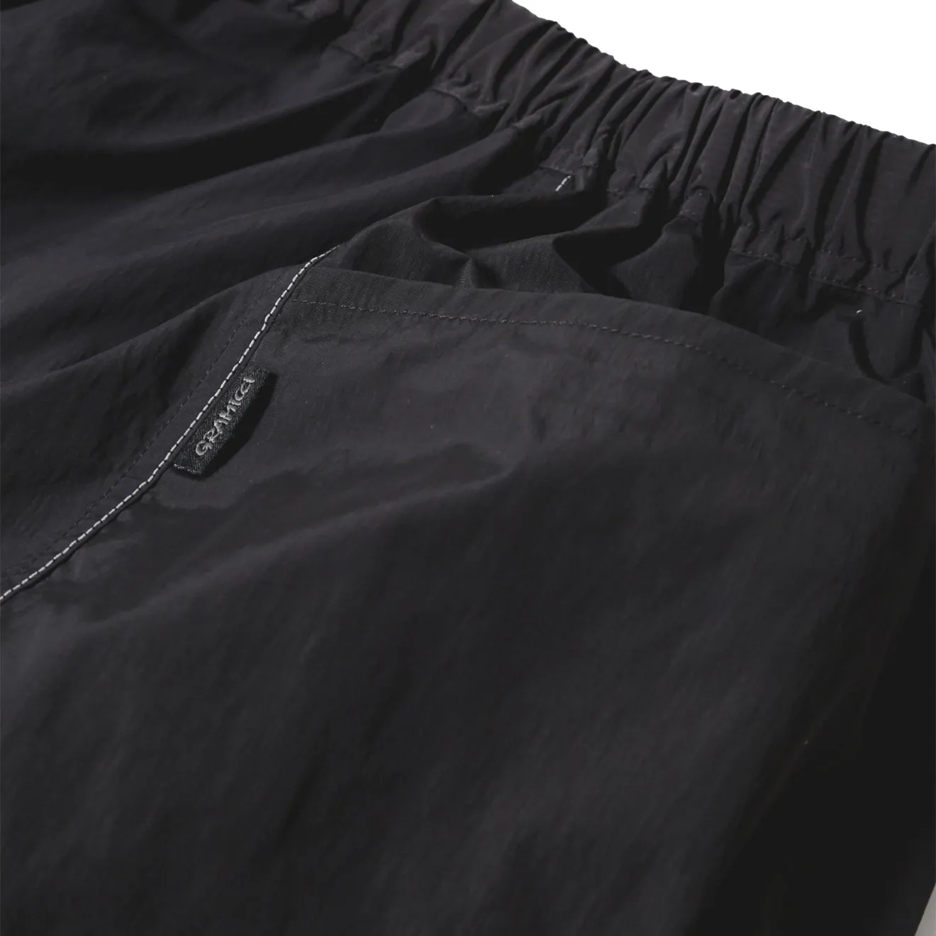 Gramicci x And Wander Patchwork Wind Short Black